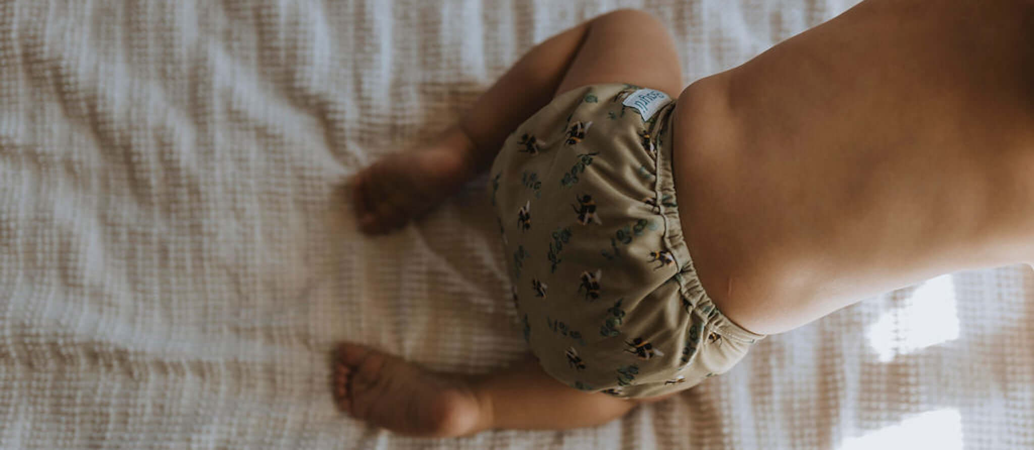 Baby wearing Bayrli Everyday Diaper